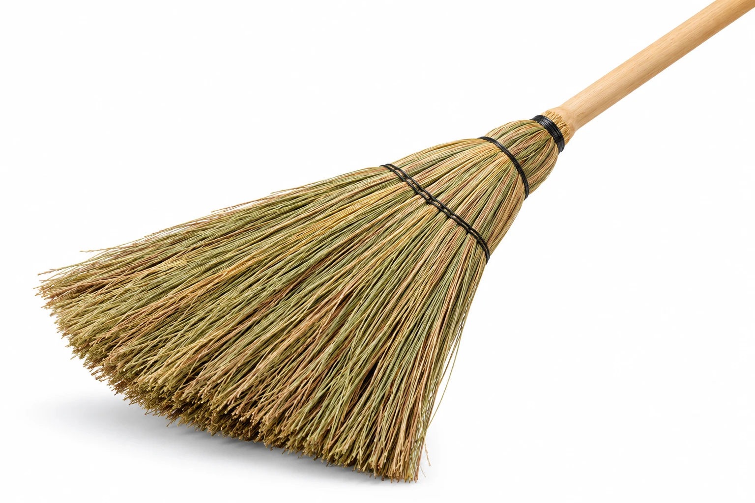 Gras Besem, a traditional grass broom with wooden handle